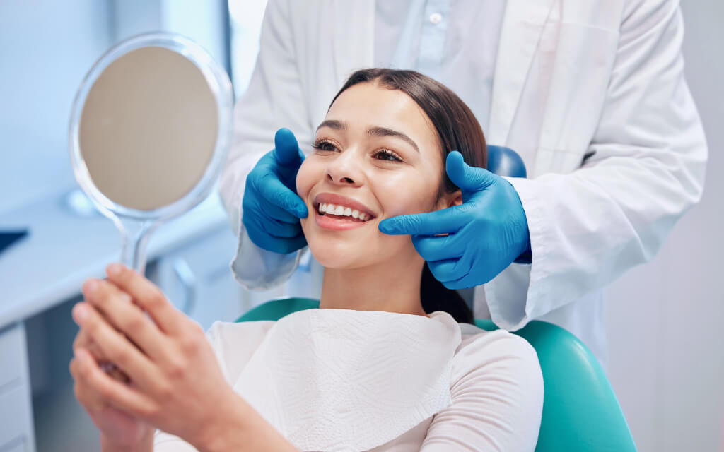 woman smiling at the dentist